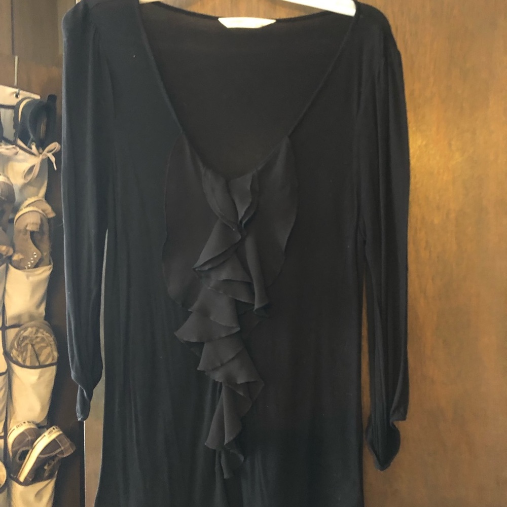 Black ruffle front top